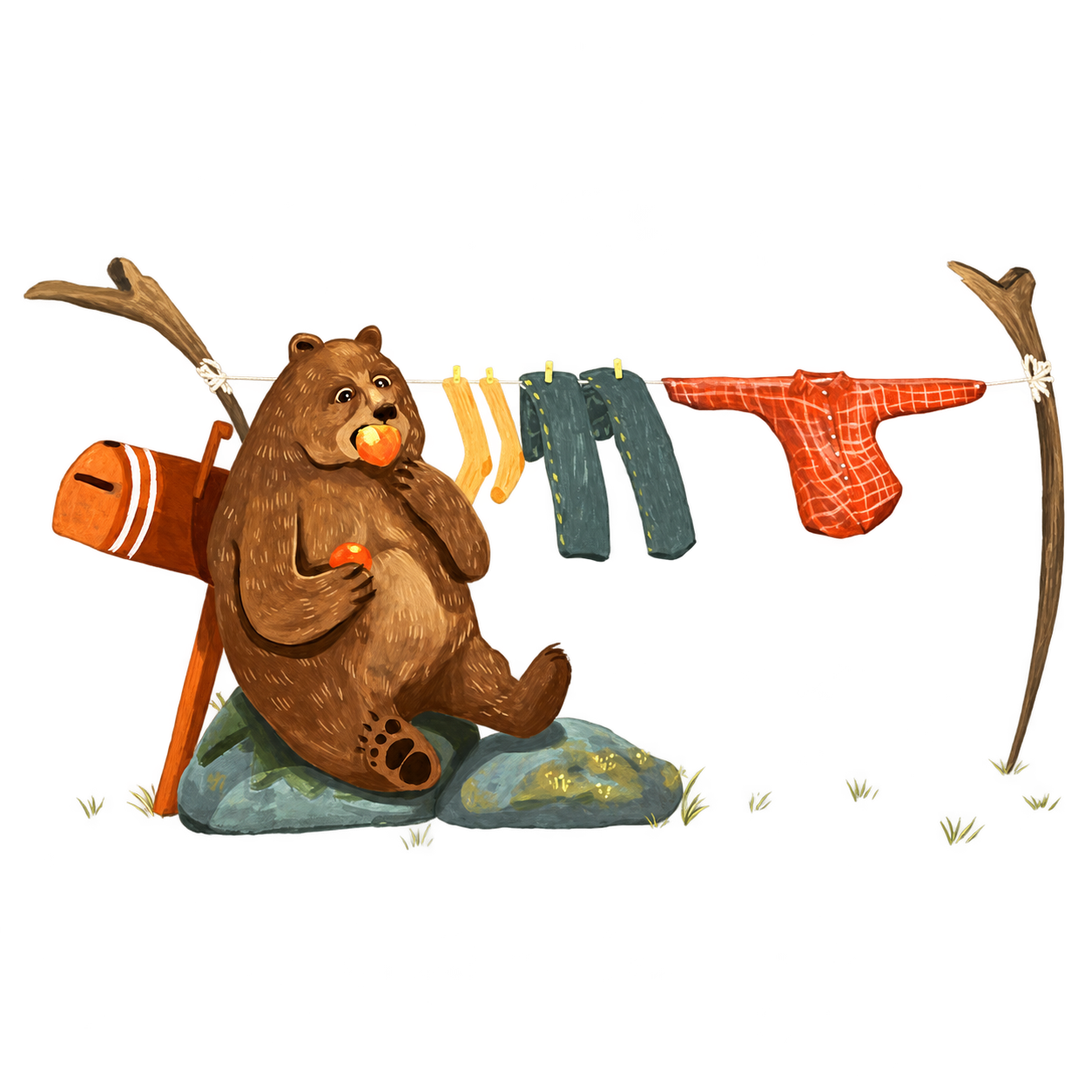 A bear drying clothes beside a branch.